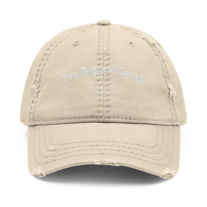 Beige baseball cap with 'The Biggest Catch' text on a white background